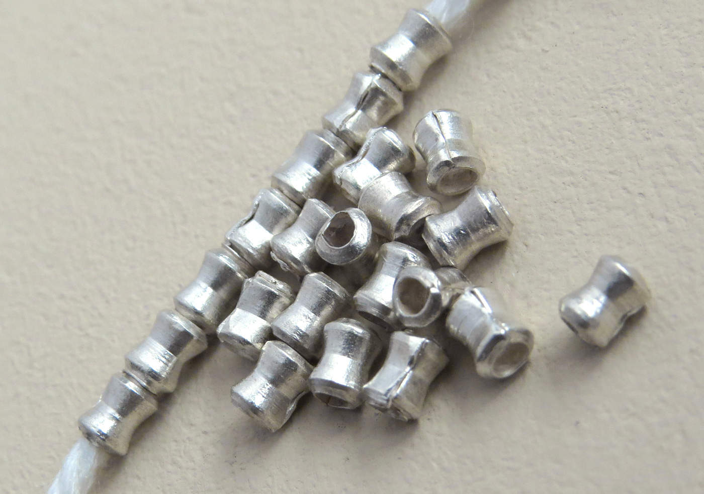 Fine Silver 3mm Hourglass Beads